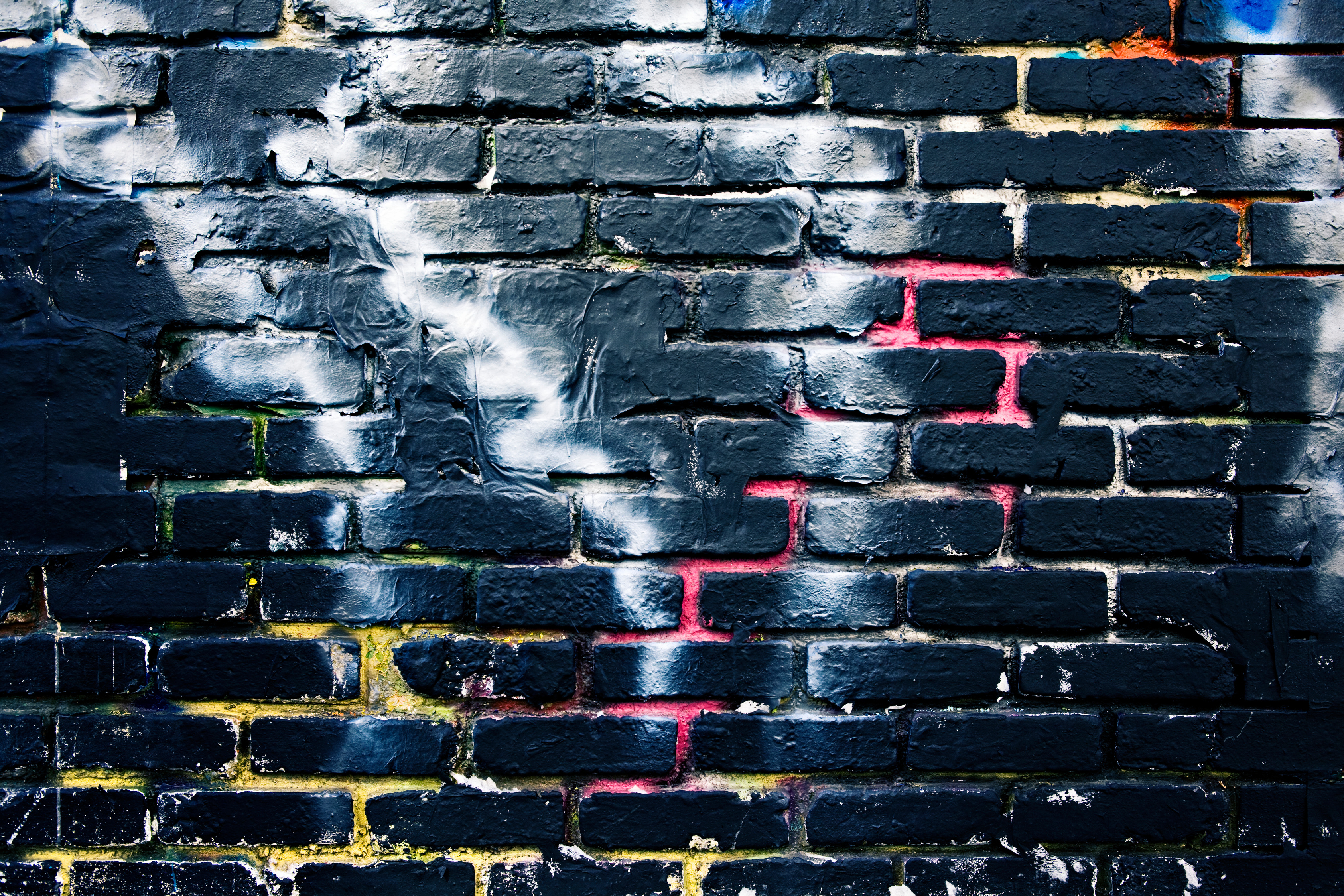 black brick graffiti wall background
